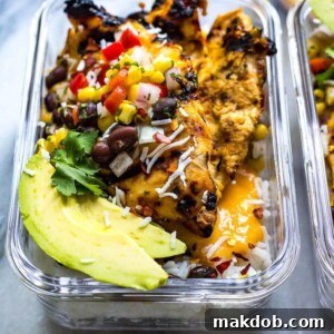 A picture of a glass container filled with delicious coconut mango chicken, ready for a meal.
