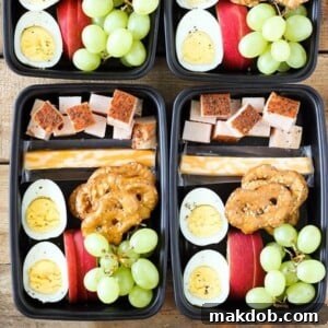 A neatly arranged deli-style protein snack box, perfect for on-the-go nutrition.
