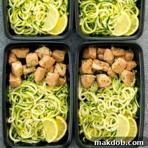 An image of several containers filled with lemon garlic butter chicken and fresh zucchini noodles.