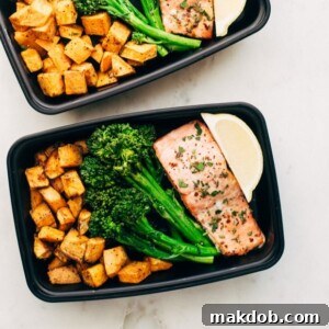 An image of perfectly roasted salmon accompanied by sweet potatoes and tender broccolini.