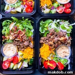 A vibrant selection of bowls featuring individual components of a delicious cheeseburger, perfect for custom assembly.