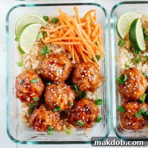An image of savory sriracha meatballs accompanied by sweet carrots.