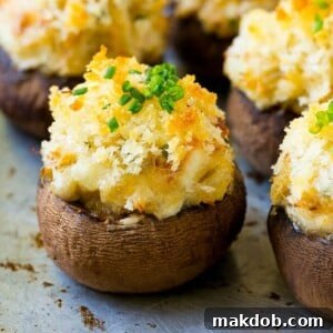 Crab stuffed mushrooms with cremini mushroom caps filled with a creamy seafood filling.
