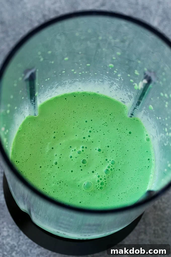 Whip Up Your Own Shamrock Shake 5 Green milkshake in a blender.