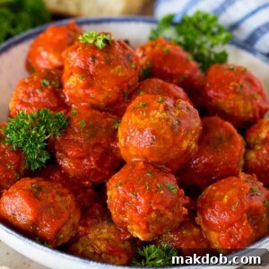 A bowl of savory Italian meatballs in a rich tomato sauce.