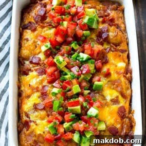 This breakfast casserole with bacon is a hearty meal that's full of eggs, cheese, and potatoes. It's perfect for a holiday breakfast!