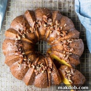 An image of an Irish cream Bundt cake with a slice removed.