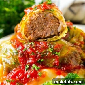 Stuffed cabbage rolls filled with beef and rice then topped with homemade tomato sauce.