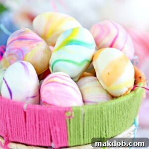 A picture of marbled Easter egg truffles in a basket.