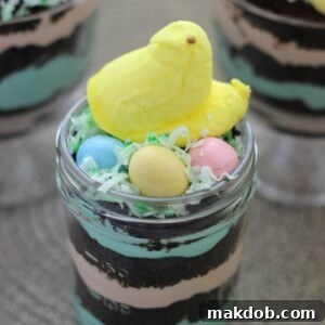 An image of festive Peeps dirt pudding cups, a fun and delicious Easter treat for the family.