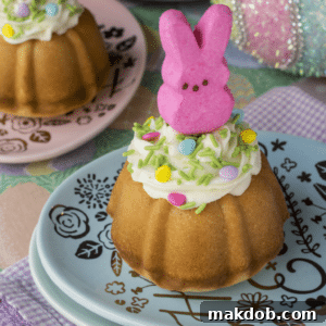 An image of charming mini Bundt cakes, each topped with a colorful Peeps candy, ideal for Easter celebrations.