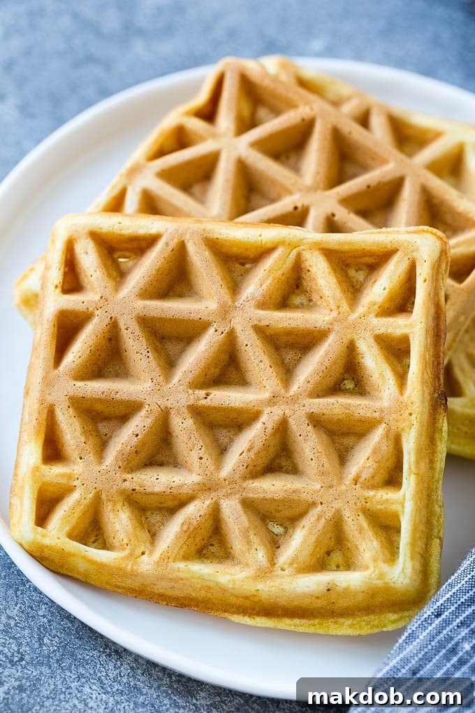 Strawberry Waffles | Homemade Waffles Recipe | Waffles with Strawberry Sauce | Homemade Strawberry Sauce #strawberry #waffles #breakfast #dinneratthezoo Homemade waffles cooking on a waffle iron, ready for strawberry sauce.