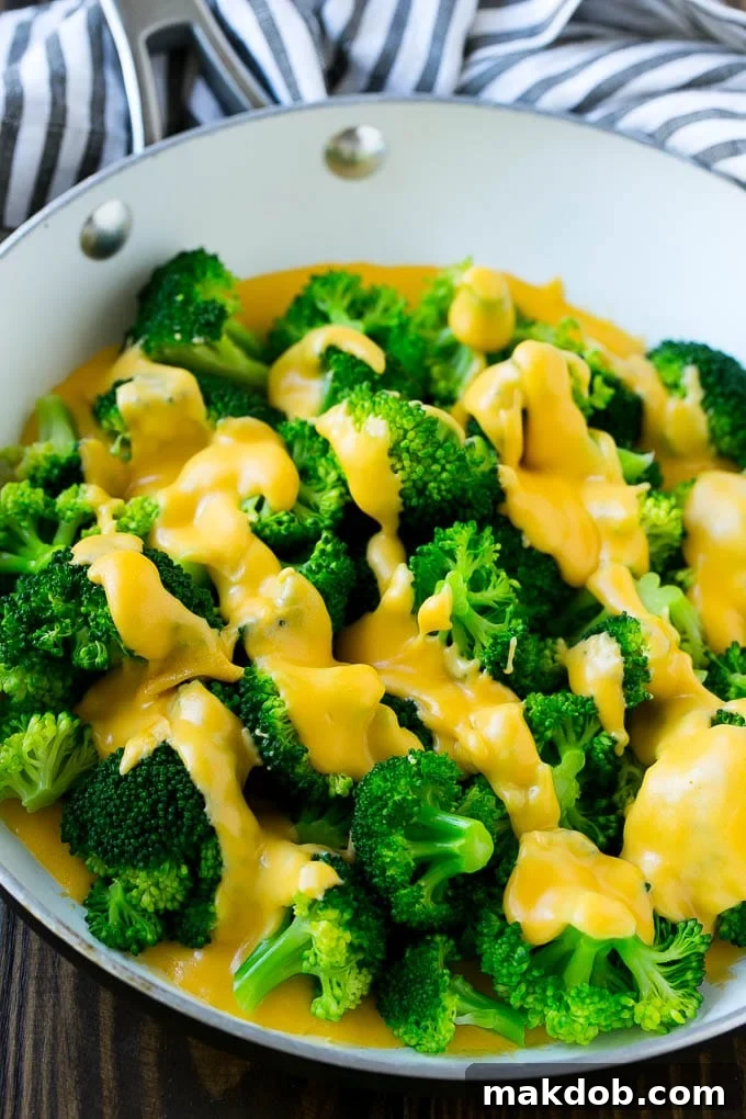 Brokoli Peynir Soslu Tarifi | Ev Yapımı Peynir Sosu | Brokoli Yancı #brokoli #peynir #düşükkarbonhidrat #yancı #dinneratthezoo A pan of broccoli topped with cheese sauce.