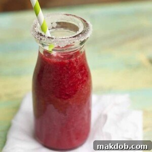 An image of a small bottle of raspberry lemonade.