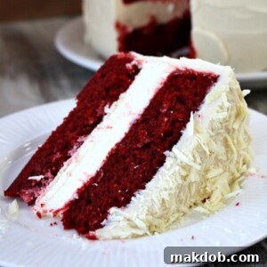 A picture of red velvet cheesecake on a plate.
