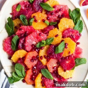A bright and refreshing Citrus Salad, featuring segments of various citrus fruits like juicy oranges and tangy grapefruit, for a burst of Vitamin C.