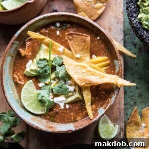 An inviting bowl of slow cooker chipotle chicken tamale chili, bursting with flavor.