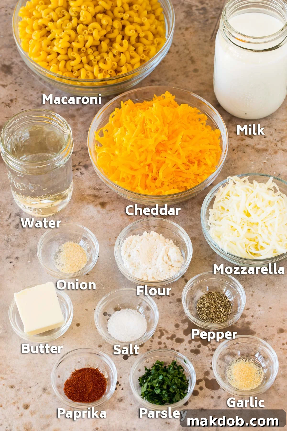 One-Pan Creamy Mac 3 Bowls of ingredients including macaroni, cheeses and seasonings.