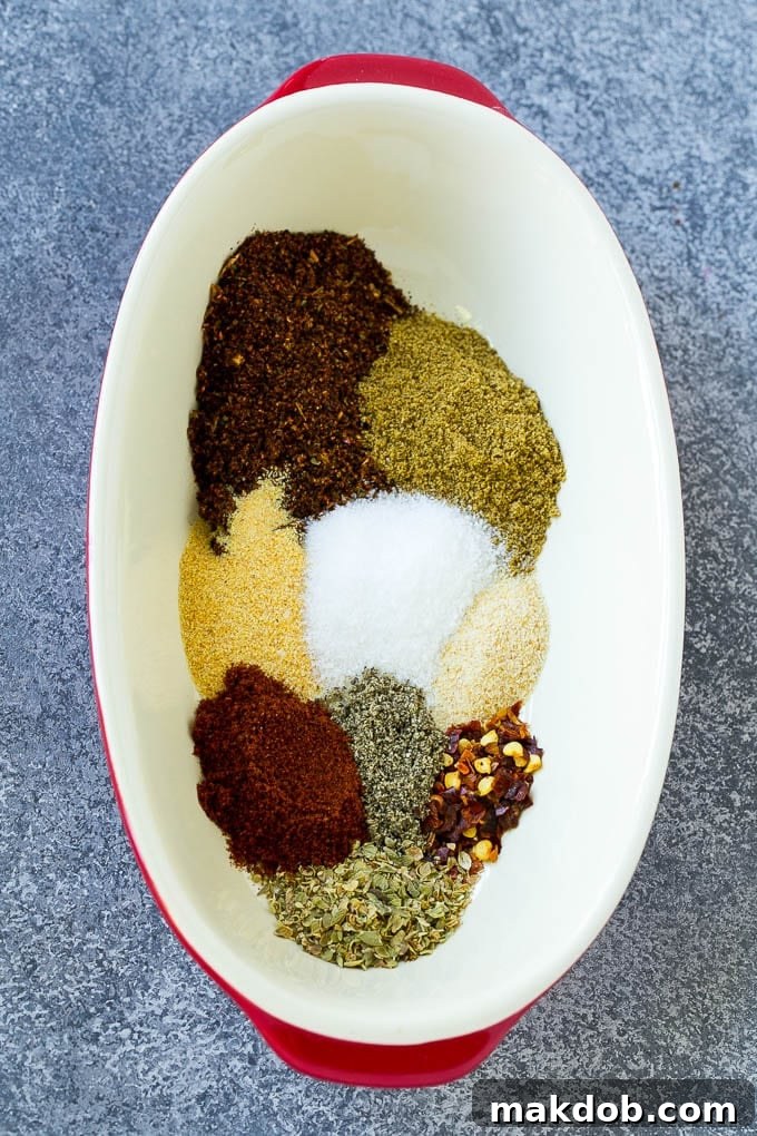 A blend of chili powder, cumin, garlic powder, onion powder, salt, pepper, smoked paprika, oregano, and red pepper flakes for homemade taco seasoning.
