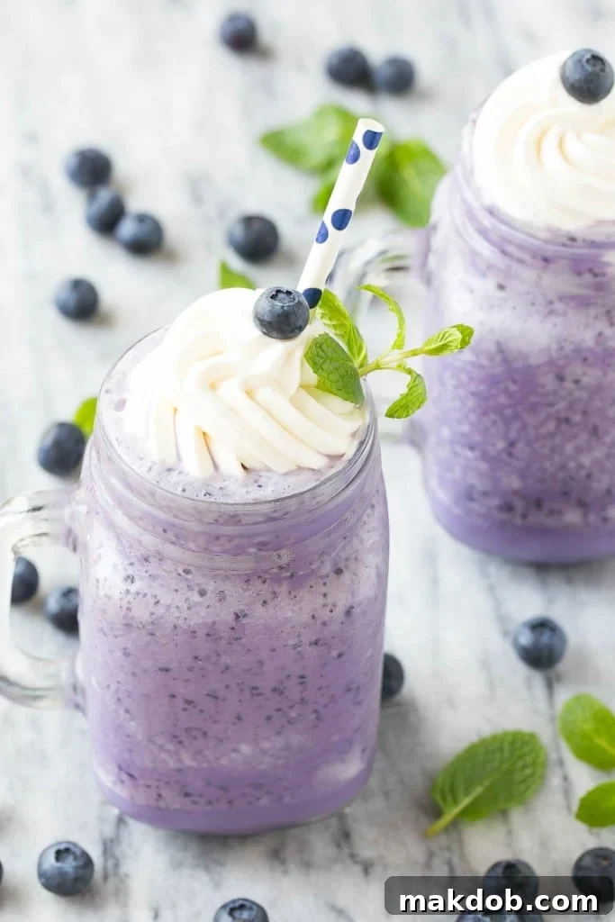 A refreshing, light blueberry milkshake with 70% less calories, perfect for summer.
