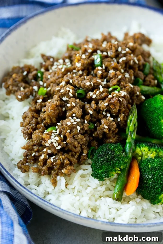 A Korean beef bowl with steamed rice and vegetables.