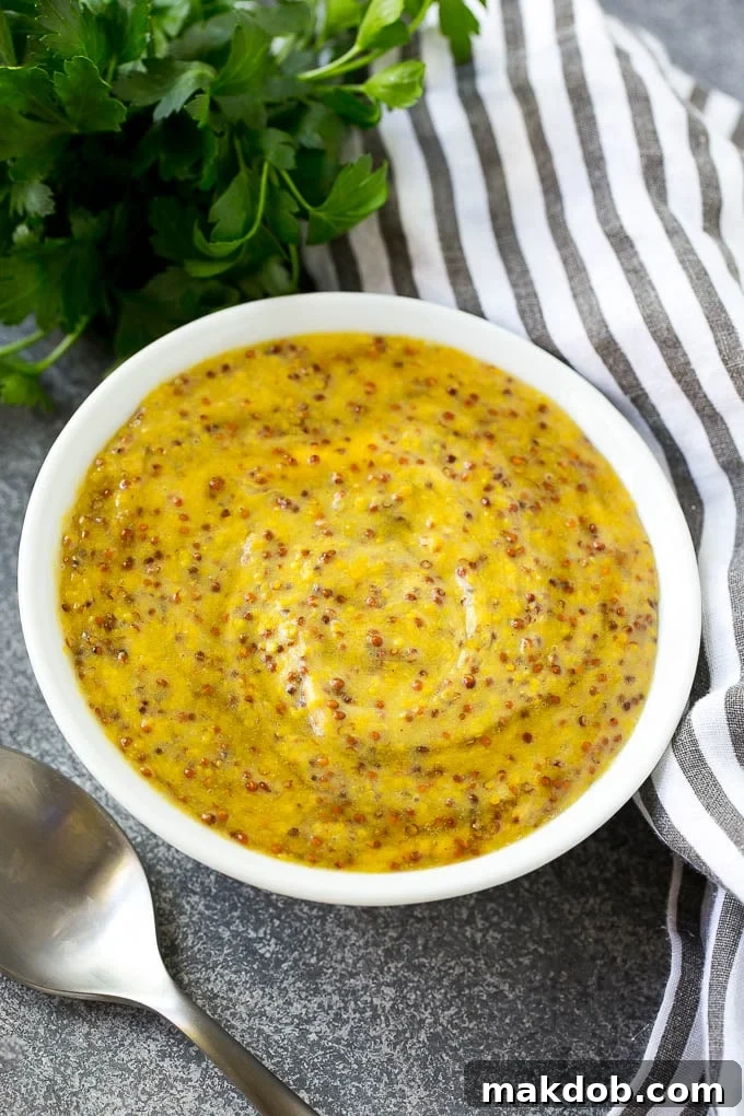 A bowl of honey mustard sauce.