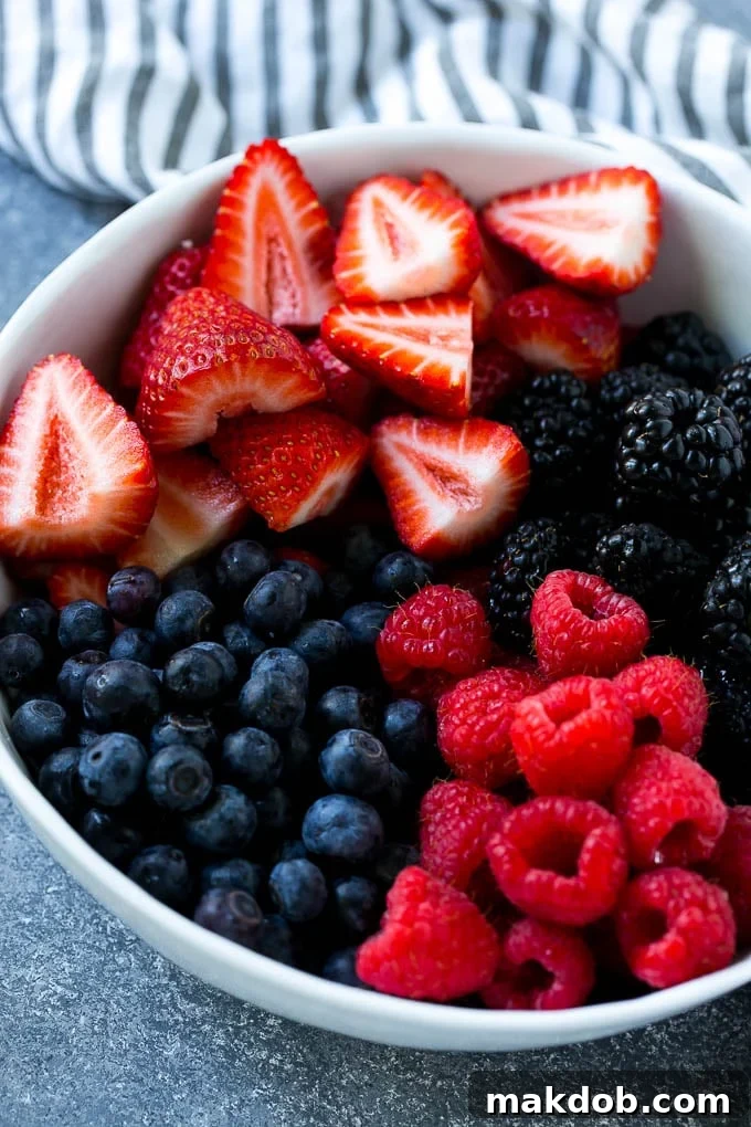 Berry Fruit Salad Recipe | Berry Salad | Summer Berry Salad | Fruit Salad Recipe #berries #fruitsalad #dinneratthezoo A bowl of blueberries, raspberries, blackberries and strawberries.