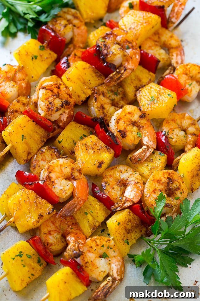 Jerk shrimp kabobs made with fresh pineapple, red bell peppers and jerk seasoning.
