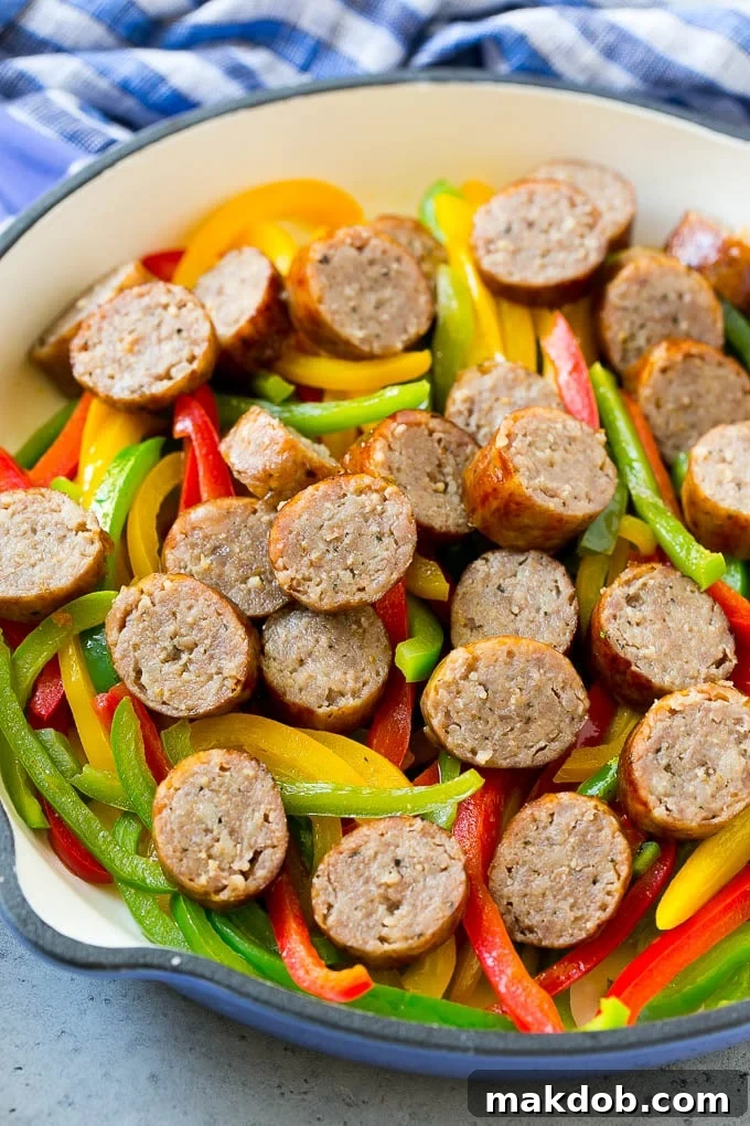 Sausage and Pepper Pasta Recipe | Italian Sausage Recipe | Sausage and Peppers | Easy Pasta #pasta #sausage #peppers #dinner #dinneratthezoo Sausage and peppers in a skillet.