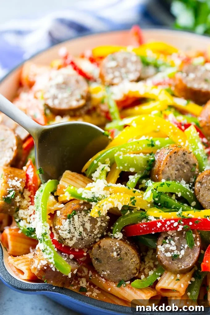 Sausage and Pepper Pasta Recipe | Italian Sausage Recipe | Sausage and Peppers | Easy Pasta #pasta #sausage #peppers #dinner #dinneratthezoo Sausage and pepper pasta with Italian sausage, topped with parmesan cheese.