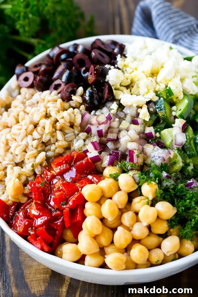 Farro Salad Recipe | Healthy Salad #salad #healthy #cleaneating #farro #dinner #dinneratthezoo Vegetables, chickpeas and farro topped with herb dressing.