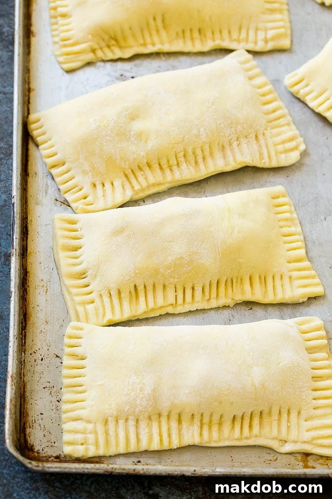 Fried Apple Pies Recipe | McDonald's Copycat Recipe | Apple Pie | Apple Hand Pies #pie #apples #applepie #dessert #snack #dinneratthezoo Puff pastry apple hand pies ready to go into the fryer.