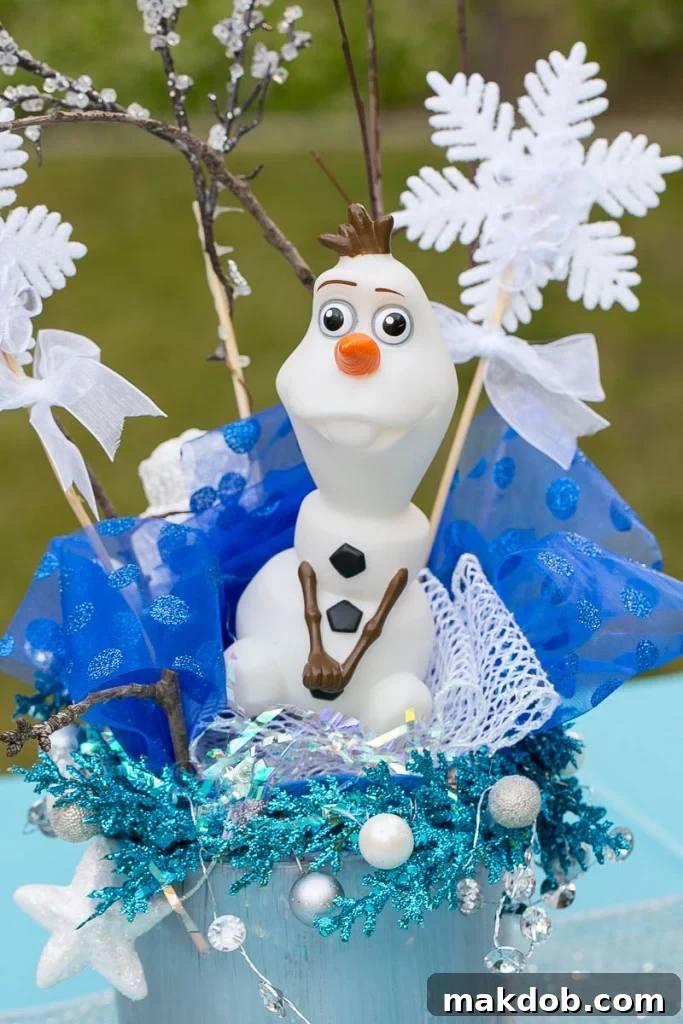 How to plan an amazing frozen birthday party without spending a ton of money. Ideas for decorations, food, activities and more!