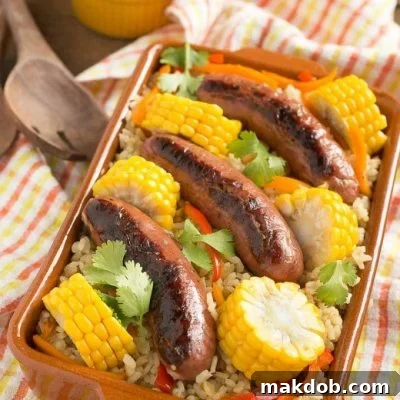 This sausage and rice bake is full of summer vegetables and is a complete meal in one pot!