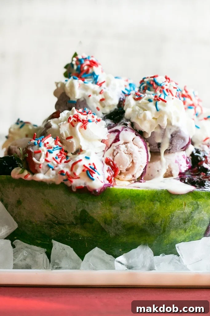 Stunning Red White and Blueberry Sundae served in a watermelon, perfect for 4th of July