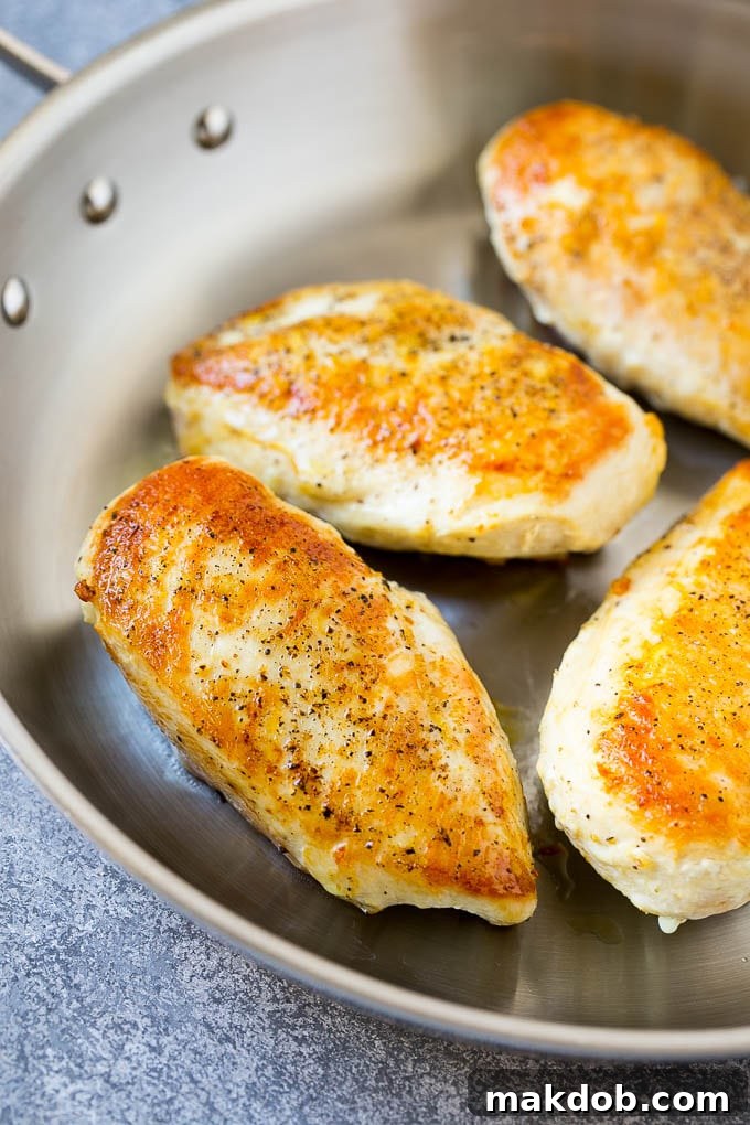 Mushroom Chicken Recipe | Chicken with Mushrooms | Chicken in Mushroom Sauce #chicken #mushrooms #bacon #dinner #dinneratthezoo Seared chicken breasts in a skillet.
