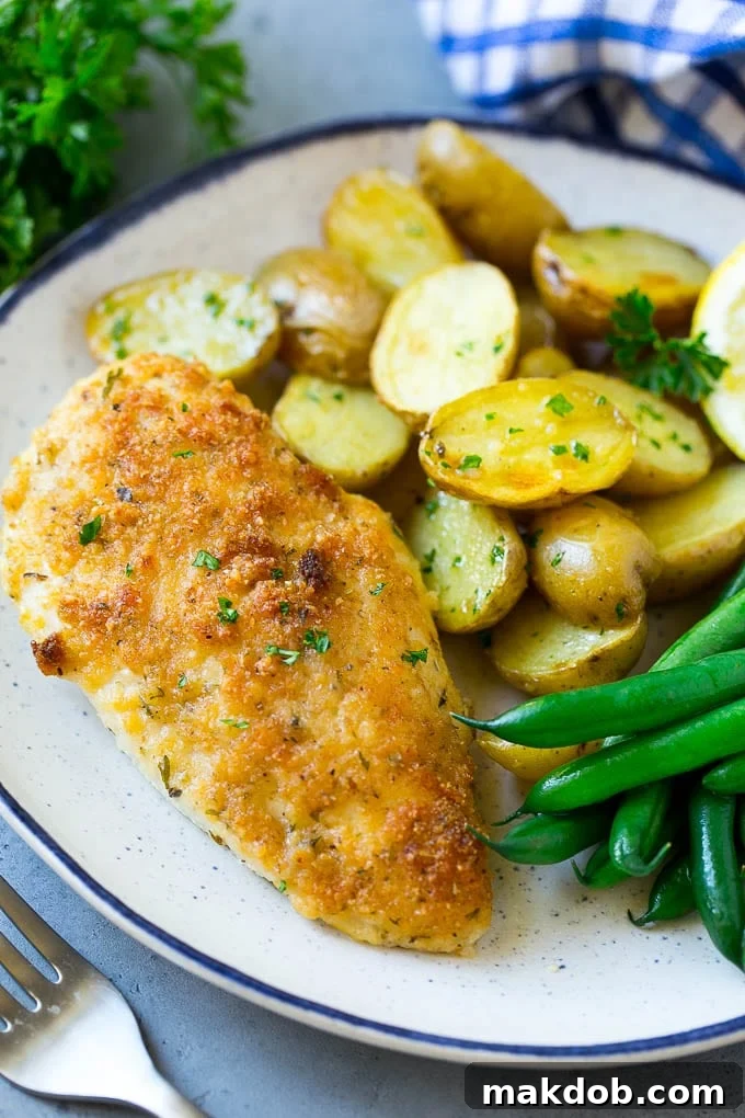 Italian Chicken Recipe | Sheet Pan Chicken | Baked Chicken #chicken #potatoes #dinner #dinneratthezoo A plate of Italian chicken, roasted potatoes and green beans.