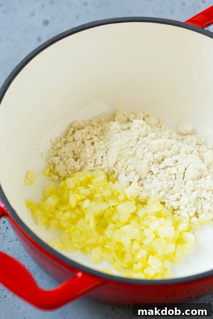 Sauteed onions and masa harina in a soup pot.