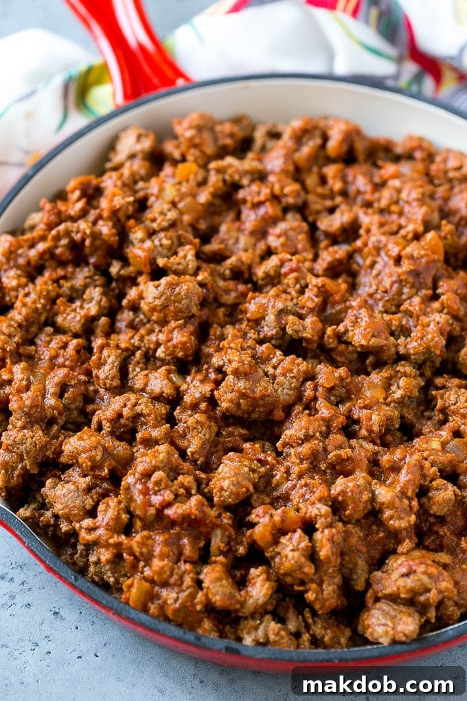Nacho Sloppy Joes Recipe | Ground Beef Recipe | Easy Sloppy Joes #beef #nachos #cheese #spicy #sandwich #dinner #dinneratthezoo Seasoned Mexican ground beef in a skillet.