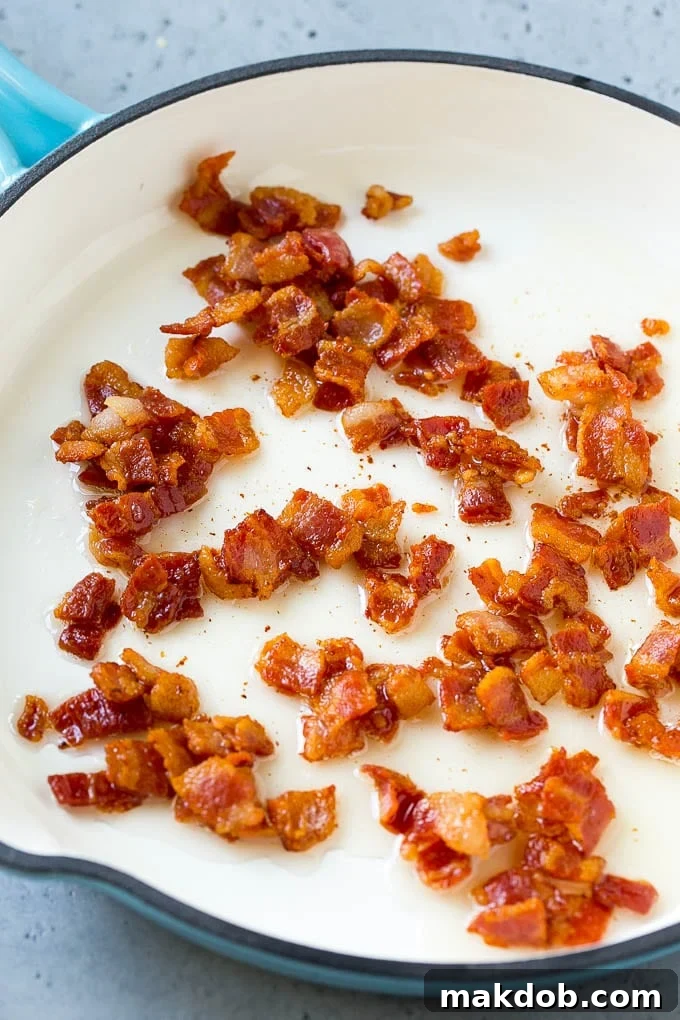 Cooked bacon in a skillet.
