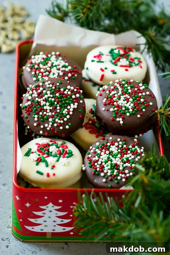 Christmas chocolate covered Oreos in a festive gift tin, perfect for holiday giving.