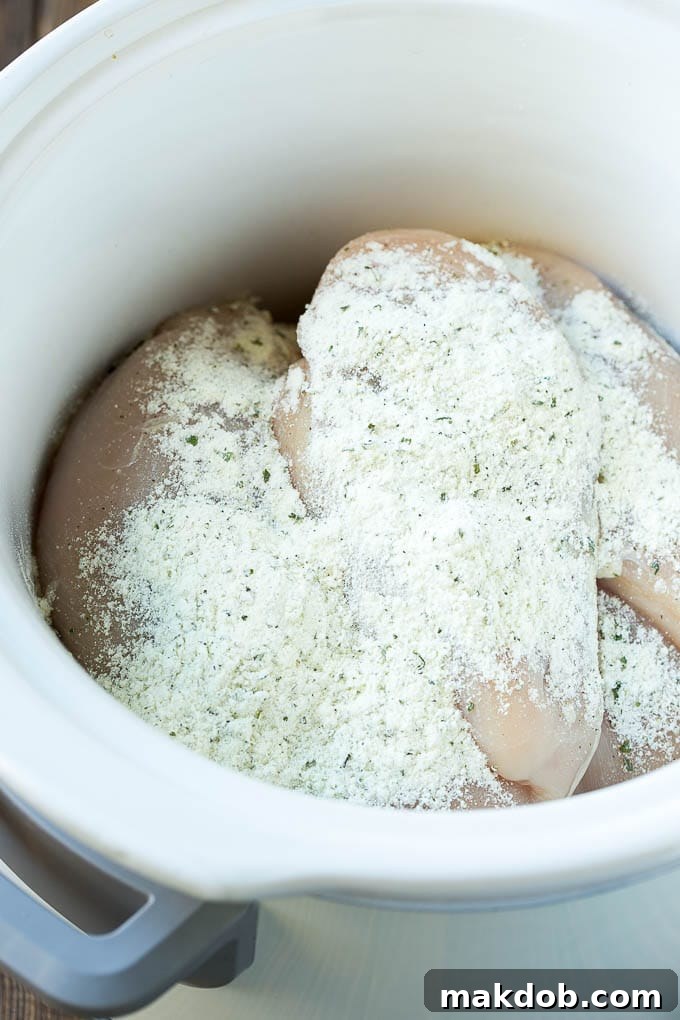 Chicken breasts topped with ranch seasoning.
