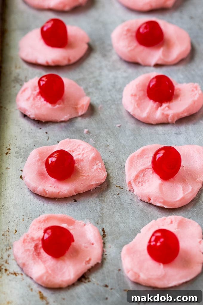 Chocolate Covered Cherries Recipe | Cherry Cordials | Cherry Candy #chocolate #candy #dessert #cherry #sweets #dinneratthezoo Discs of cherry filling with a maraschino cherry on top.