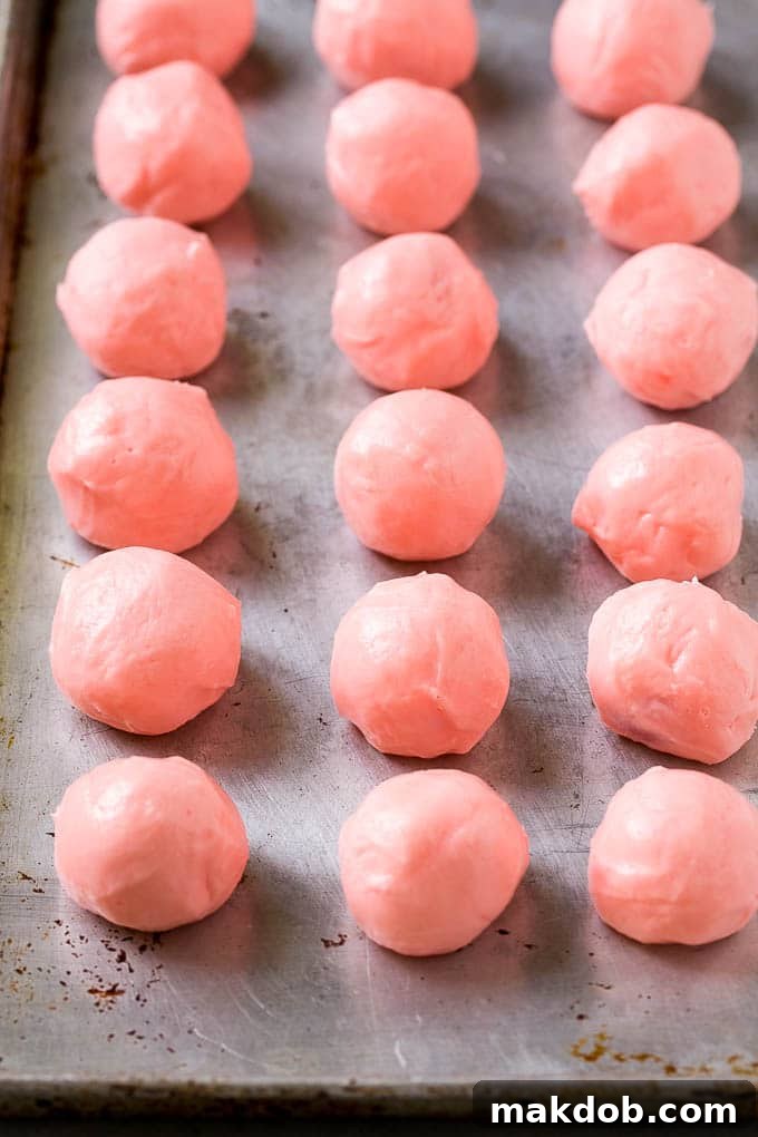 Chocolate Covered Cherries Recipe | Cherry Cordials | Cherry Candy #chocolate #candy #dessert #cherry #sweets #dinneratthezoo Pink fondant wrapped maraschino cherries.