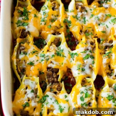 Fiesta Pasta Shells 2 A baking dish of Mexican stuffed shells filled with ground beef and cheese.