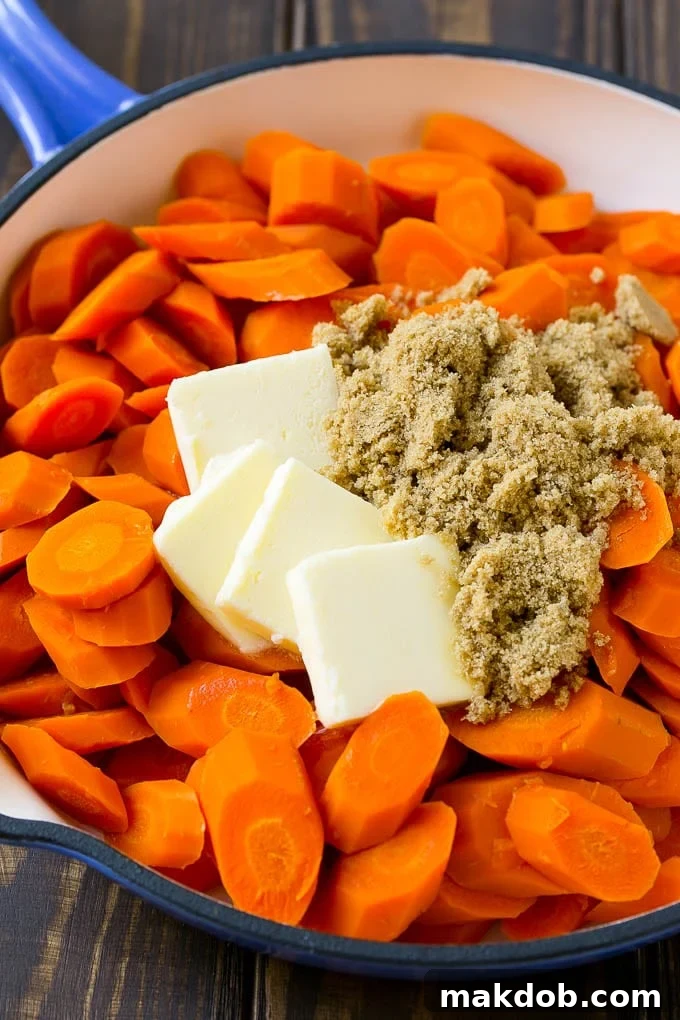 Sliced cooked carrots with butter and brown sugar.
