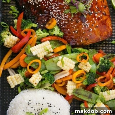 Hoisin Lime Glazed Salmon - The salmon and vegetables cook together on the same pan for a quick, healthy and easy dinner!