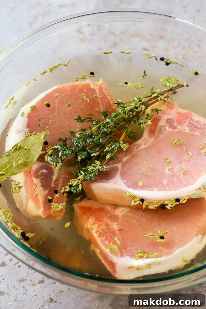 Brining Pork Chops | Pork Brine Recipe | Step 1 Smoked Pork Chops #pork #brine #smoker Pork chops in a bowl of brine, ready for refrigeration.