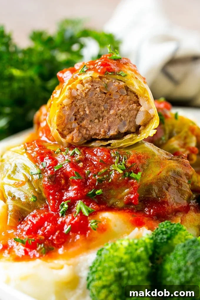 Stuffed cabbage rolls filled with beef and rice then topped with homemade tomato sauce.