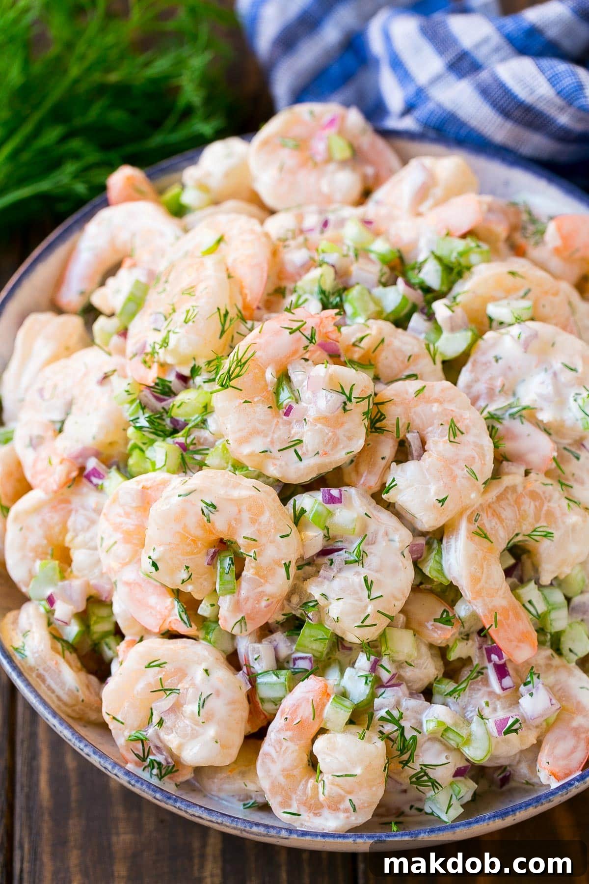 Zesty Shrimp Salad 2 Shrimp salad in a serving bowl, topped with fresh dill.